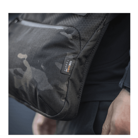 Detail of M-Tac Konvert Bag Elite made from Cordura 500D and 1000D with adjustable shoulder strap and magnetic closure.