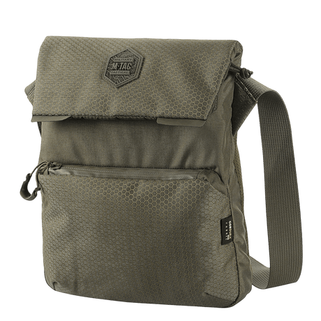 M-Tac Konvert Taske Elite in durable Cordura material with adjustable shoulder strap and magnetic flap for quick access.