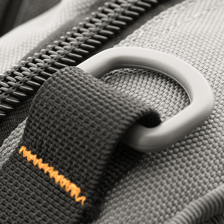 Close-up of M-Tac Urban Line City Patrol bag focusing on zipper and strap detail.