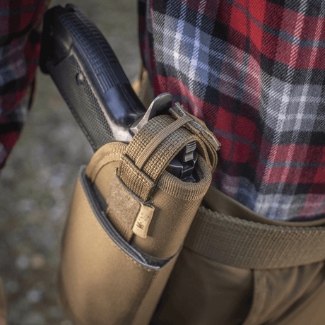 M-Tac Universal Tactical Holster Elite Right mounted on belt with pistol, made of laminated Cordura 500D with Laser Cut technology.