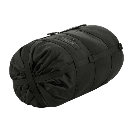 Black M-Tac Compression Sack in durable nylon with compression straps for storage and transport, ideal for moisture protection.