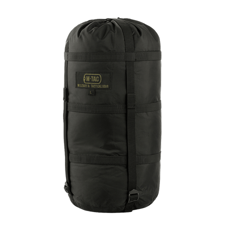 M-Tac Compression Sack in black nylon with compression straps, ideal for protection against moisture and space saving during transport.