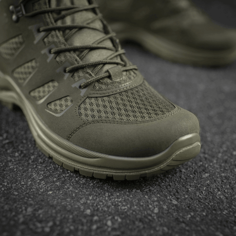 M-Tac Tactical Summer Boots Iva for comfort and breathability on a black asphalt road.