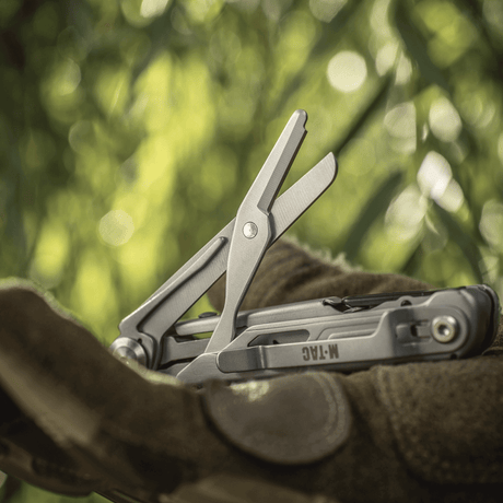 M-Tac Type 3 Folding Knife (5-in-1) Stainless Steel with tool display, including scissor function, in a natural EDC environment.
