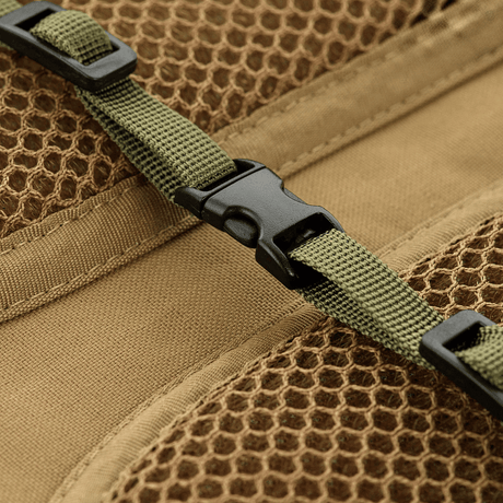 Close-up of M-Tac Backpack Cover Large with durable nylon mesh and buckle, ideal for protection from rain and snow during outdoor activities.