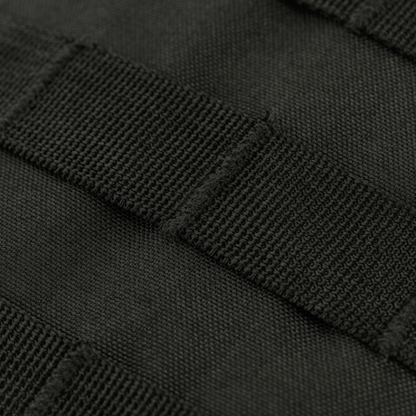 Detailed image of M-Tac Assistant Bag with MOLLE panels for extra gear. Compact single-strap backpack in durable 600D material.