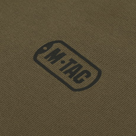 M-Tac Cotton Raglan Hard Hoodie i 100% bomuld med fleecefor - nærbillede af stoffet med M-Tac logo. Ideel til efterår, vinter og forår.