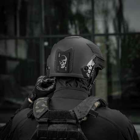 M-Tac Patch Face of War (Embroidered) on helmet with skull symbol inspired by the "card of death" from the Vietnam War, attached with Velcro.