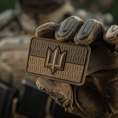 M-Tac Ukraine Flag patch with ZSU Trident PVC held by a person, showing Ukrainian army pride and national heritage in 3D design
