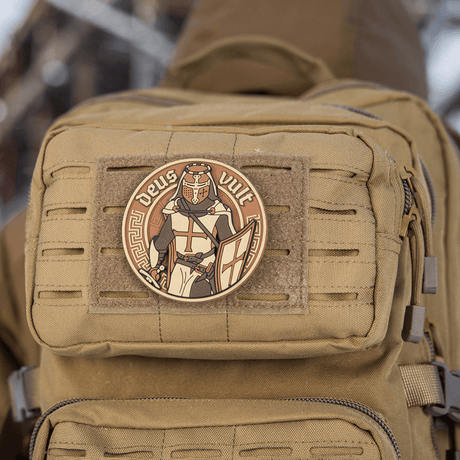 M-Tac Deus Vult 3D PVC Patch attached to backpack with Velcro, showing 3D design and 'Deus Vult' text, ideal for military and airsoft.