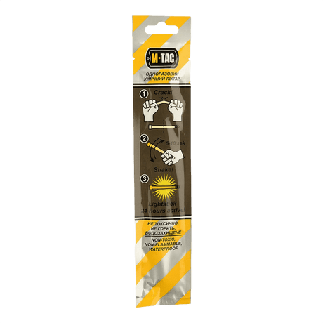 M-Tac Glow Stick 15 cm in packaging, shows usage instructions, suitable for dark areas, non-toxic and long shelf life.