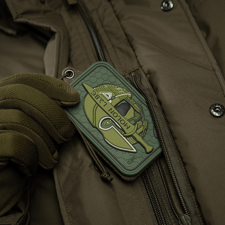 M-Tac Molon Labe 3D PVC tactical morale patch, green rubber PVC, attached to jacket with Velcro.