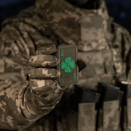 M-Tac Patch Lucky Card (Embroidered) in Cordura 500D with clover, held in hand. Suitable for clothing, bags or gear.