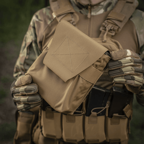 M-Tac Pouch for M249 Cartridge Box Closed in use, secured with elastic strap and Velcro, worn by an operator during an operation
