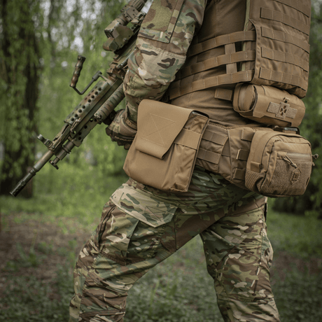 Soldier with M-Tac Pouch for M249 Cartridge Box Closed attached to a tactical vest in the field, showing functionality