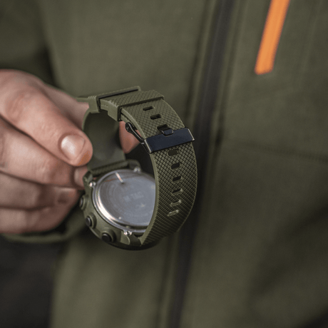M‑Tac Multifunctional Tactical Watch with robust case and olive green strap, suitable for outdoor activities and military use