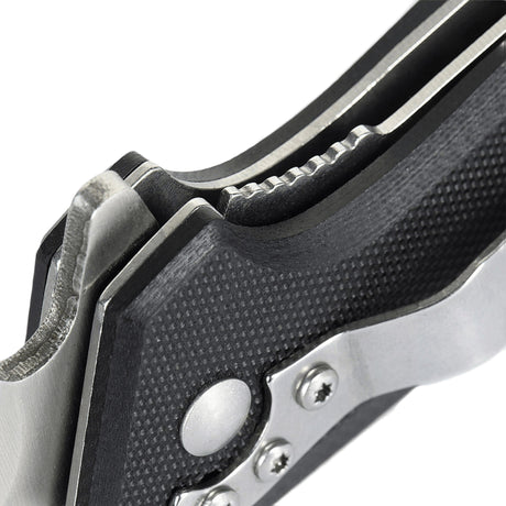 Detail of M-Tac Outdoor & Military folding knife - Type 5, chromed stainless steel blade with slip-resistant G10 composite handle.