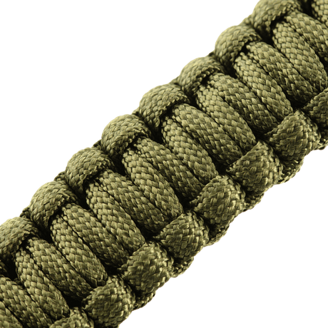 Close-up of M-Tac Paracord Bracelet with Fire Starter, Compass and Whistle in green, ideal for survival and outdoor use.