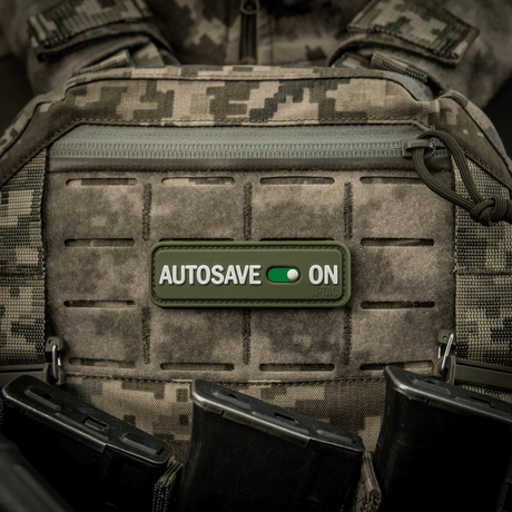 M-Tac Patch Autosave PVC in full color mounted on a tactical vest.