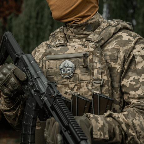 M-Tac Patch Emoji #4 PVC with 3D effect, Velcro attachment, mounted on military camouflage gear. Size 6.5 x 6.5 cm.