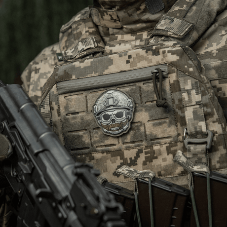 M-Tac Patch Emoji #4 with 3D PVC effect on a tactical vest, camo-style morale patch with Velcro attachment.