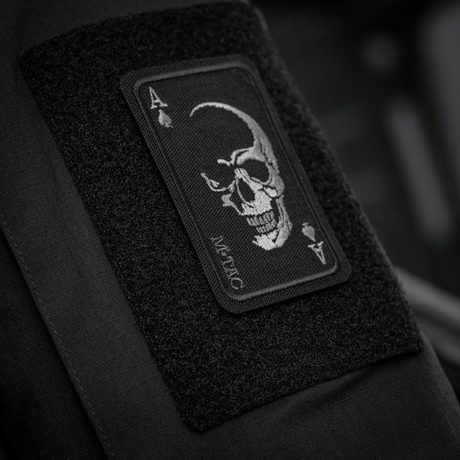 M-Tac Patch Face of War (Embroidered) with skull symbol on an ace of spades card mounted on Cordura 500D fabric.