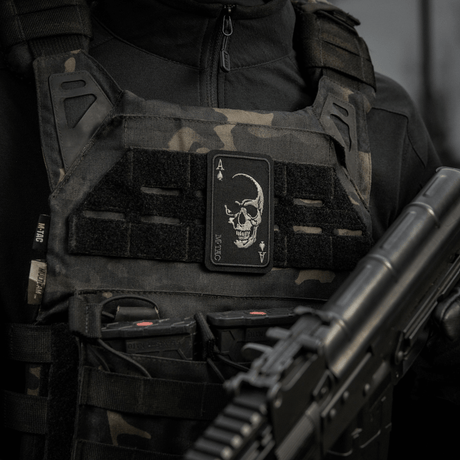 M-Tac Patch Face of War (Embroidered) on tactical vest. Embroidered skull on an ace of spades card, inspired by Vietnam.