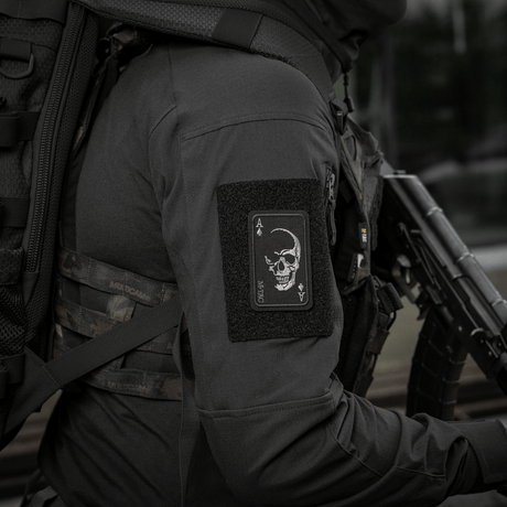 M-Tac Patch Face of War (Embroidered) embroidered skull on an ace of spades card attached to clothing, Cordura 500D, symbolizes courage and fearlessness.