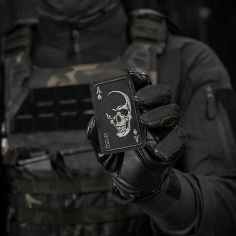 M-Tac Patch Face of War (Embroidered) in Cordura 500D with Vietnam War skull motif, mounted with Velcro on a soldier.