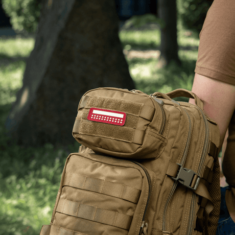 M-Tac Patch Flag 25x80 Mini Squares on a backpack outdoors, durable and easy to attach with Velcro, in robust Cordura 500D.