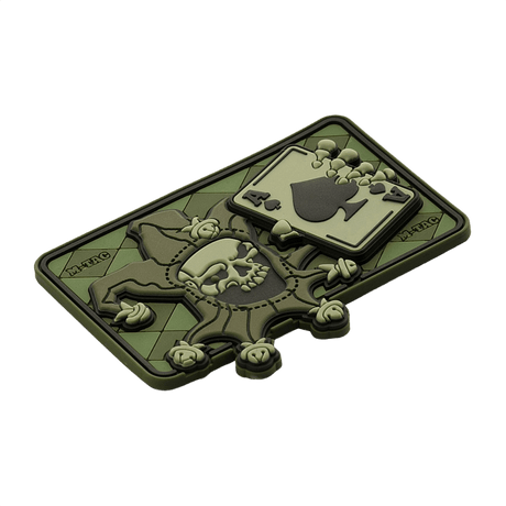 Tactical M-Tac Joker Skull 3D PVC in green with joker and death-card design, PVC with 3D effect, Velcro backing.