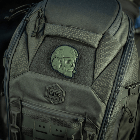 M-Tac Patch Operator 3D PVC on a tactical backpack with Velcro attachment, realistic design, suitable for clothing or gear.