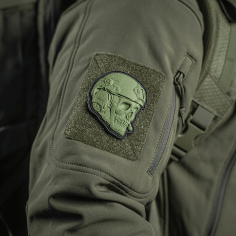 M-Tac Patch Operator 3D PVC on a tactical jacket, realistic design with Velcro, suitable for clothing, bags or gear, size 6x7 cm.