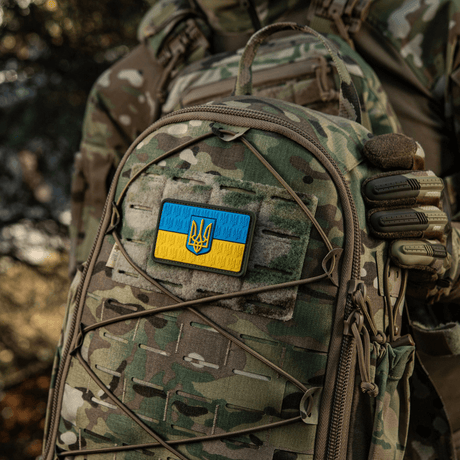 Camouflage backpack with M-Tac Patch Ukraine Flag with coat of arms in PVC 3D-relief, mounted on the back with Velcro.