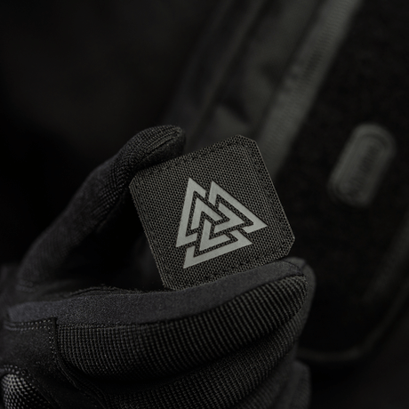 M-Tac Patch Valknut Laser Cut Odin symbol with Völknot motif on black background, held by a hand with black glove.
