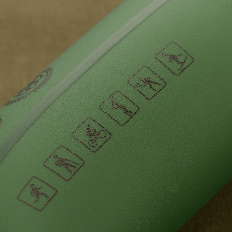 Close-up of M-Tac collapsible water bottle with sport icons, ideal for hiking, travel and cycling