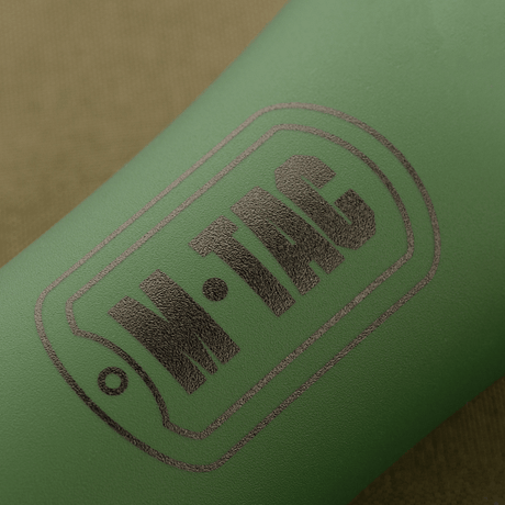 Close-up of M-Tac collapsible water bottle with logo, ideal for hiking, travel and cycling, made of food-grade TPU