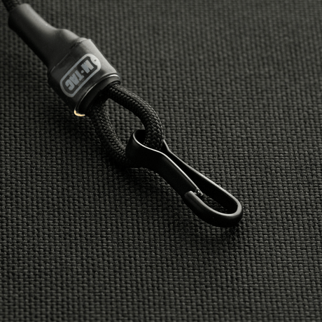 M-Tac Safety Cord Medium for Carbine with D-ring and strong spiral design for secure attachment of gear.