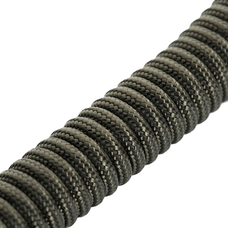 M-Tac Safety Cord with D-ring, spiral paracord and PVC design intended to secure equipment against loss or theft.