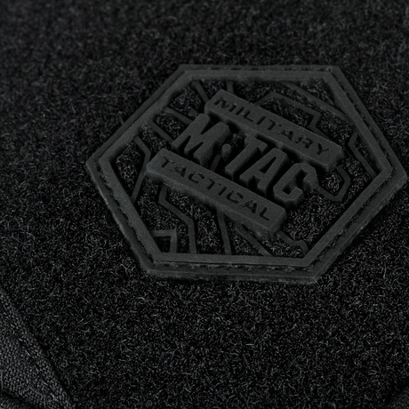 Close-up of M-Tac Sling Pistol Bag Elite Hex with Velcro logo in black Cordura material.