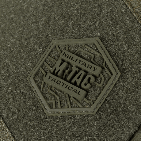 Detail of M-Tac Sling Pistol Bag Elite Hex with Velcro with military tactical logo on Cordura fabric.