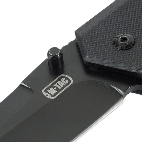 M-Tac Outdoor & Military folding knife - Type 5 with G10 composite handle close-up, showing stainless steel blade and logo.