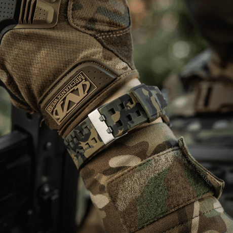 M-Tac Tactical Watch 2037 in camo design on a wrist with durable strap, suitable for tactical use and outdoor activities.