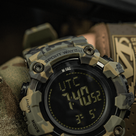 M-Tac Tactical Watch 2037 in rugged camouflage design with LED backlight and features like compass and stopwatch. Ideal for outdoor and tactical use.