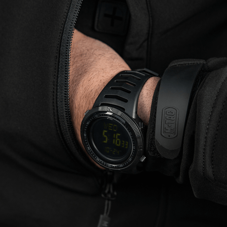 M-Tac Tactical Watch 2147 on hand, showing rugged design, durability and outdoor features including compass and LED backlight.