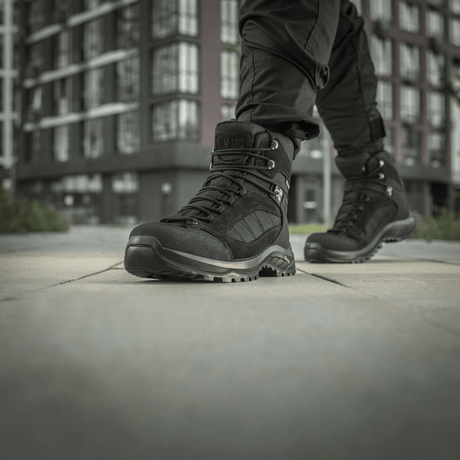 M-Tac Tactical Demi-Season Boots Pro Line in use during outdoor activity, made from durable suede and Cordura with Vibram sole.