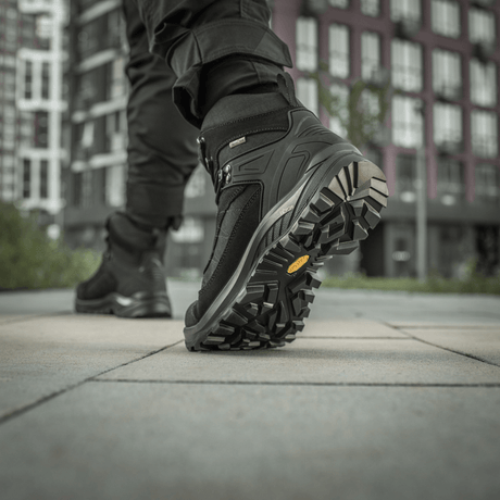 M-Tac Tactical Demi-Season Boots Pro Line with Vibram sole for tactical tasks, showing outsole and grip in an urban environment.