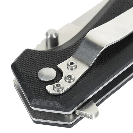 Close-up of handle on M-Tac Outdoor & Military folding knife - Type 5 with G10 composite grip and aluminum construction.