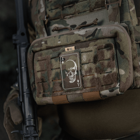 M-Tac Patch Face of War (Embroidered) on a camouflage bag with skull motif, made of embroidered Cordura 500D, inspired by the Vietnam War.