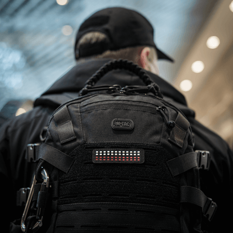 M-Tac Patch Flag 25x80 Mini Squares installed on a backpack, durable Cordura 500D with velcro mounting for a tactical look.